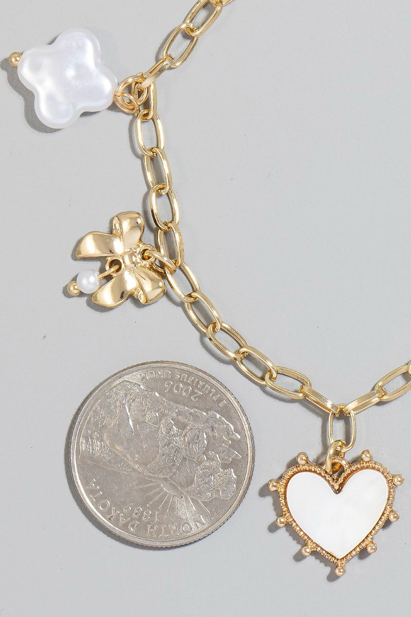 Cherub Cross Hearts And Bow Charms Chain Bracelet