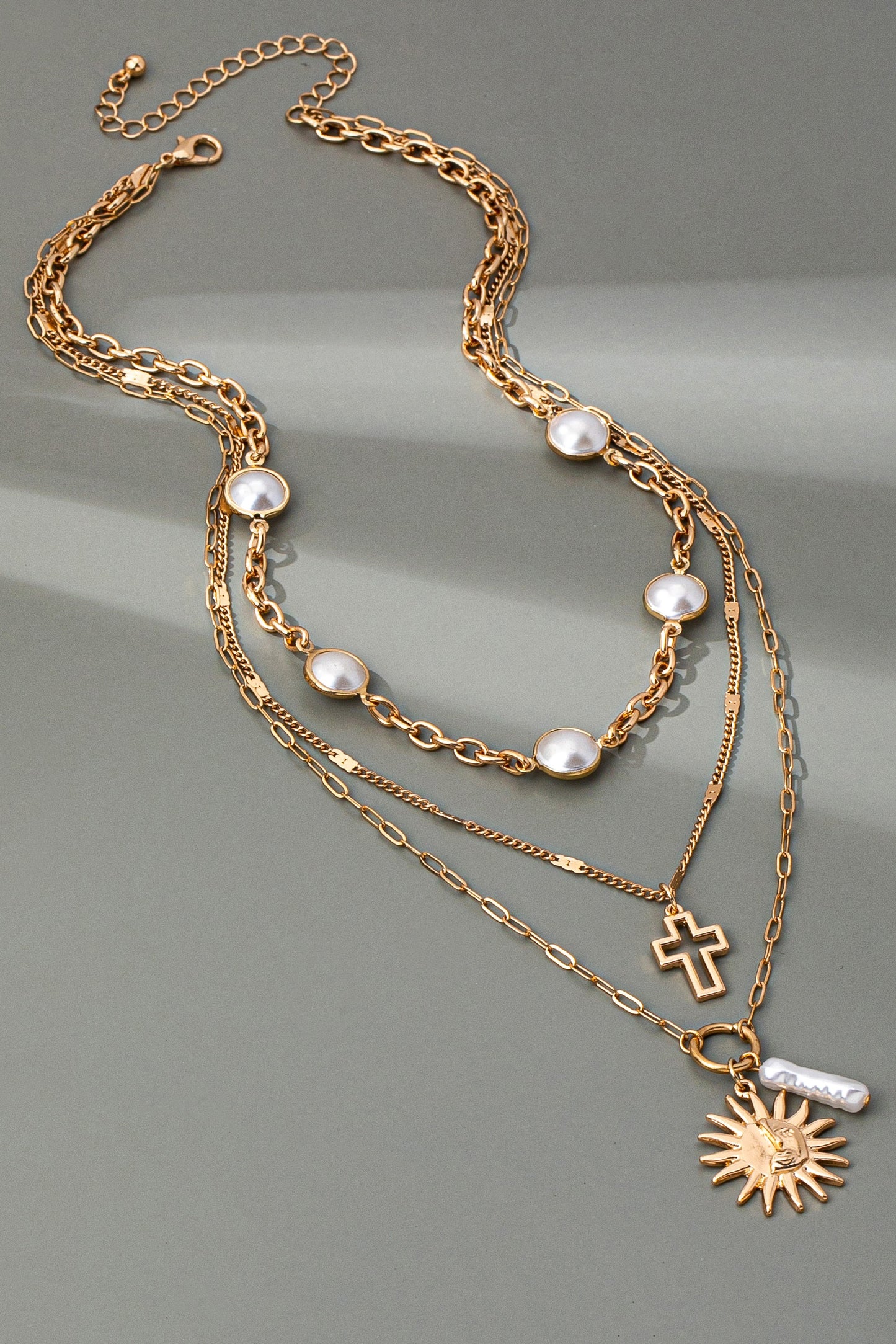 Multi Pearl Layer Pearl Sun Cross Charm Necklace