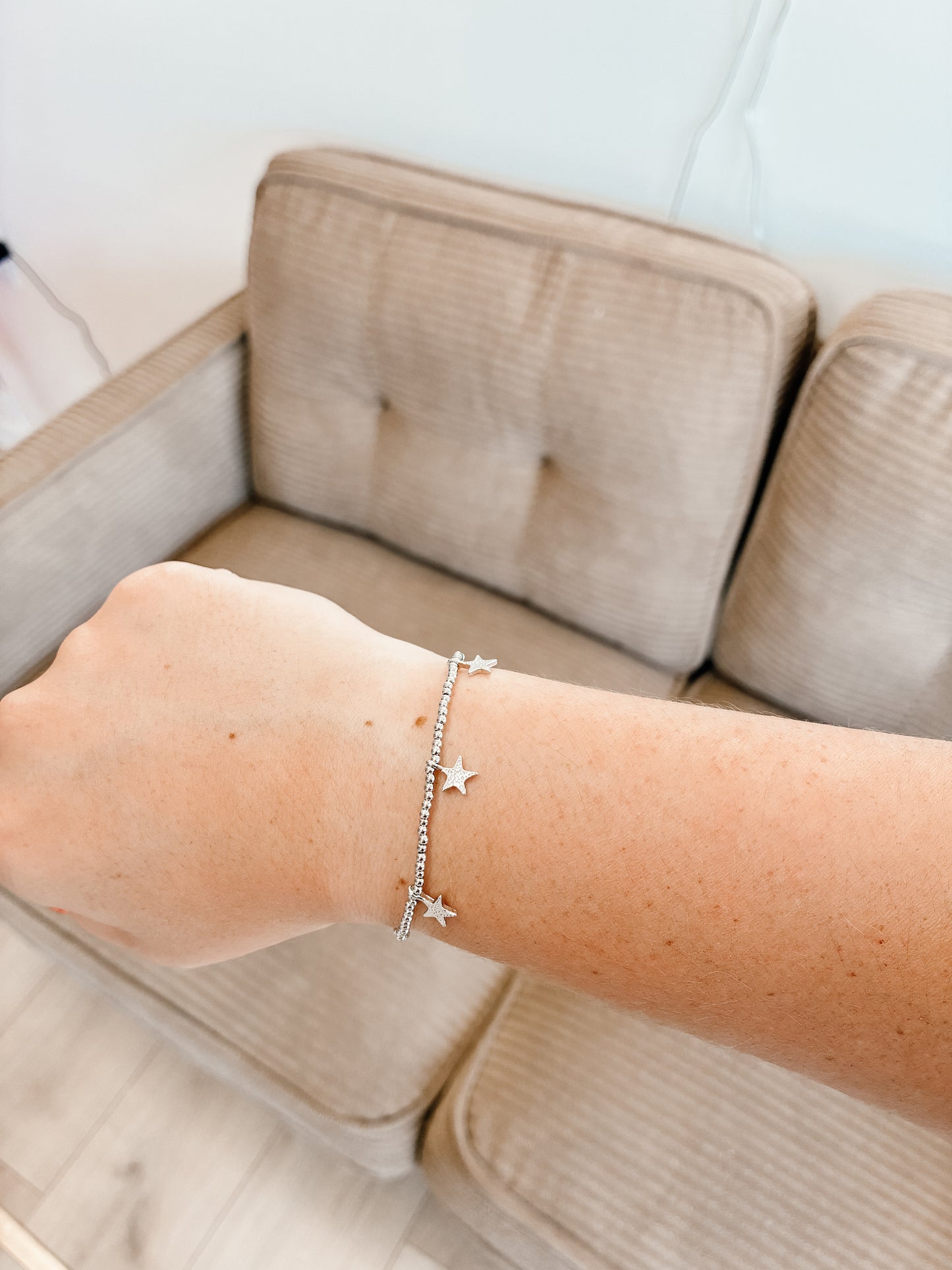 Rhodium Star Charm Pull Tie Bracelet