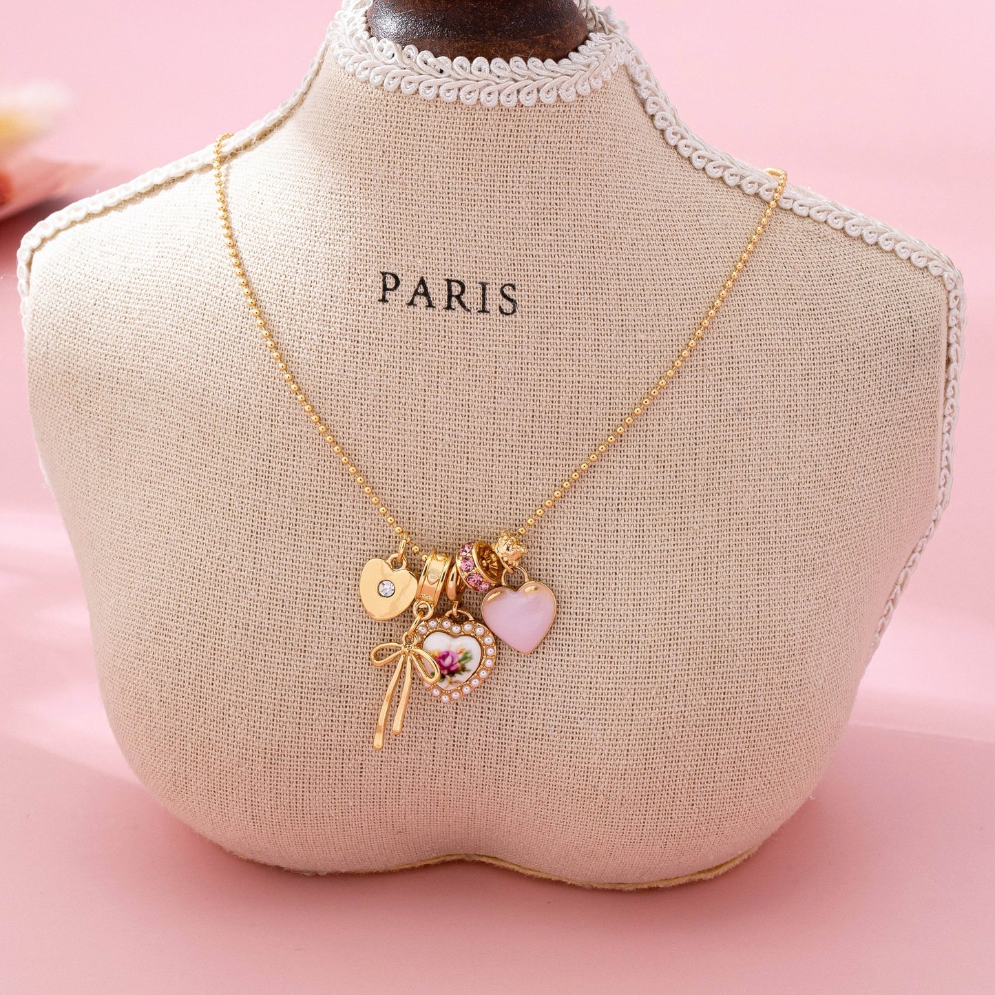 Multi Charm Porcelain Bow Ball Chain Necklace