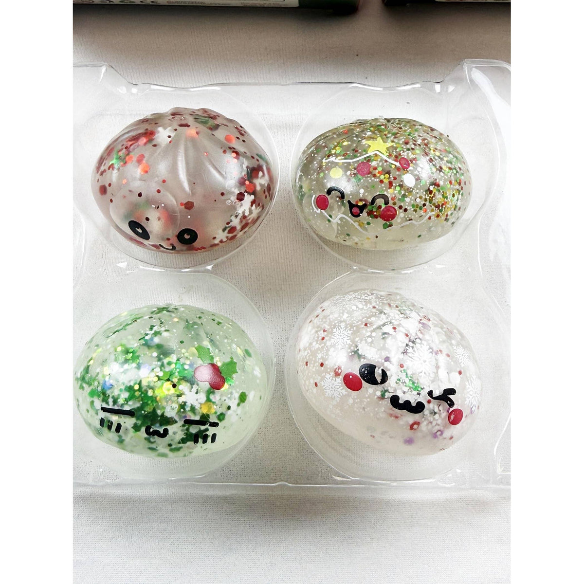 4pc Christmas Mini Dumpling Glitter Squishy Set
