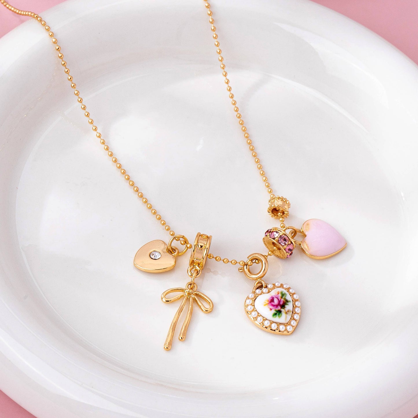 Multi Charm Porcelain Bow Ball Chain Necklace