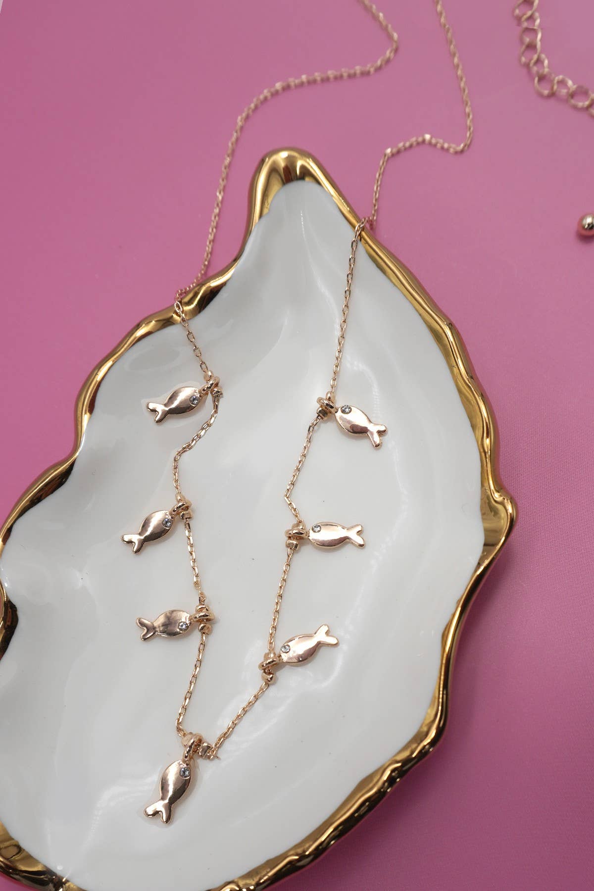 Delicate fish charm pendant stationed fine chain
